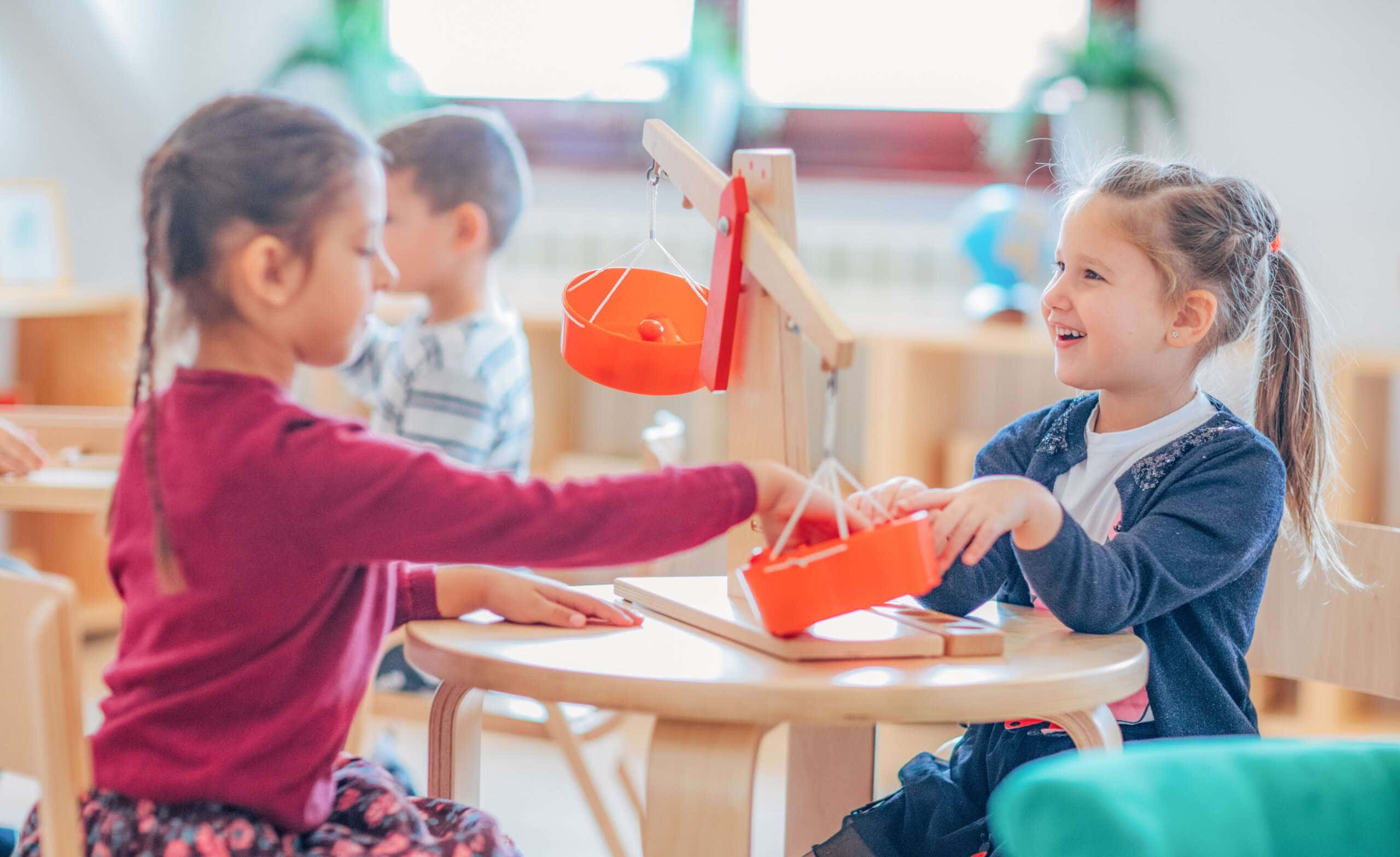 Two Primary students working together in a project-based, Reggio curriculum.