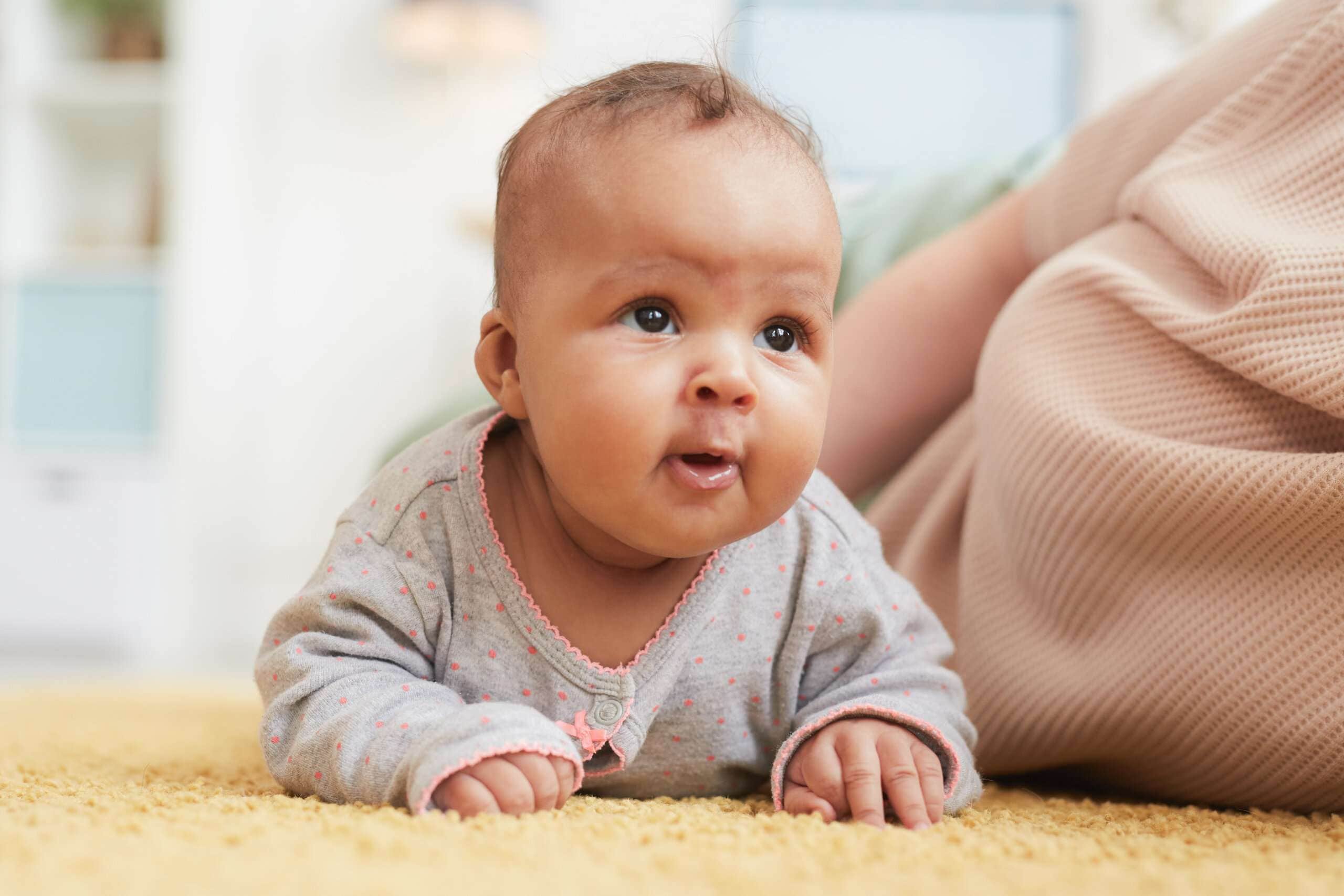 Infant strengthening neck muscles