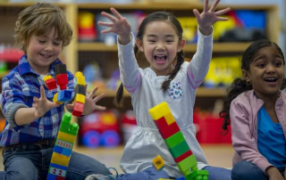 The Things We Love About Montessori article. Group of kids