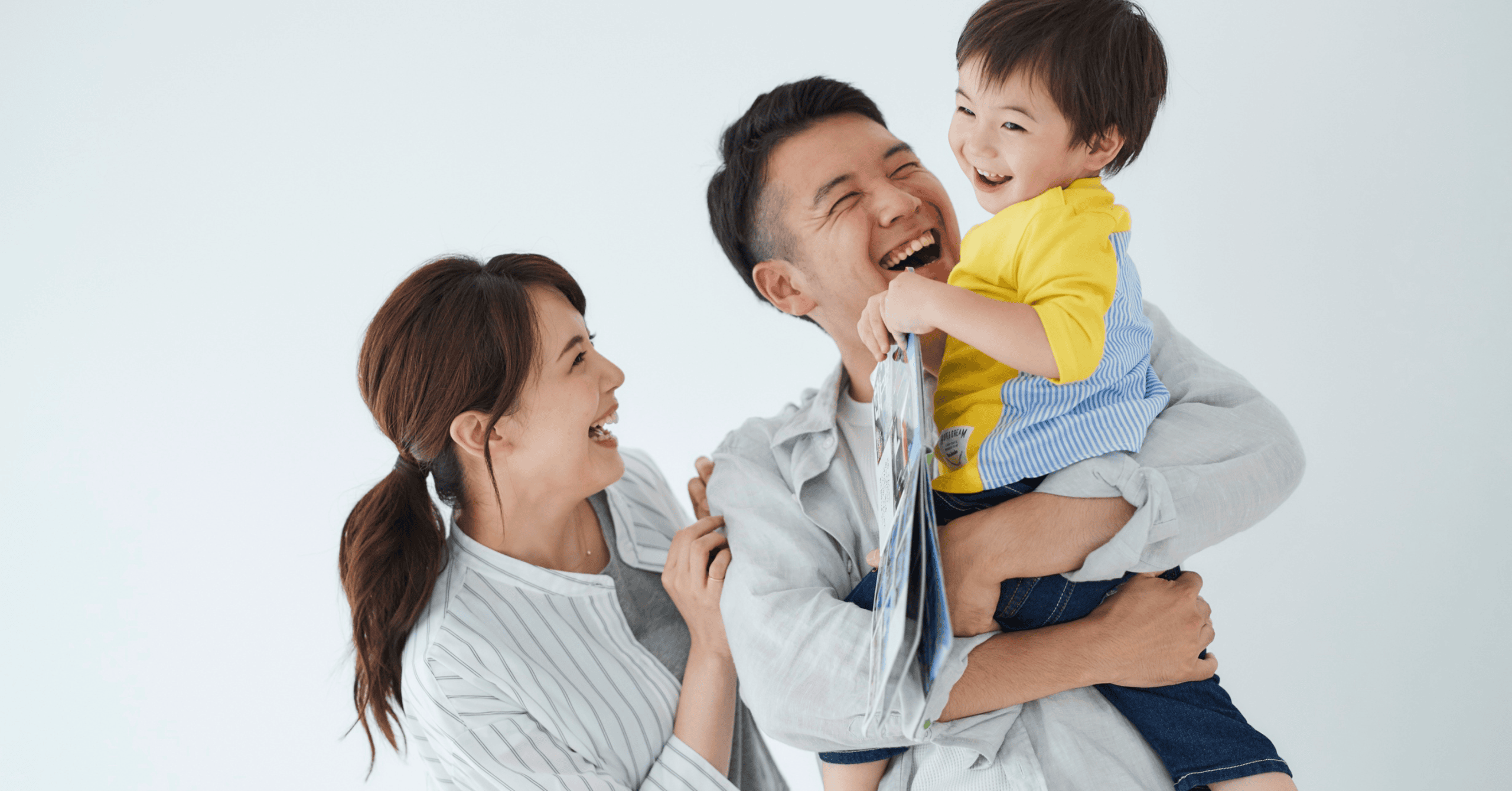 The Language of Connection: How Thoughtful Communication Shapes Your Child’s World. The image of a family