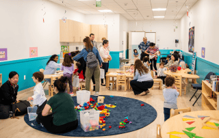 Children exploring hands-on STEAM activities at Westcliff Early Learning Academy in Irvine